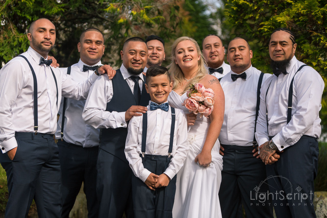couple and groomsman